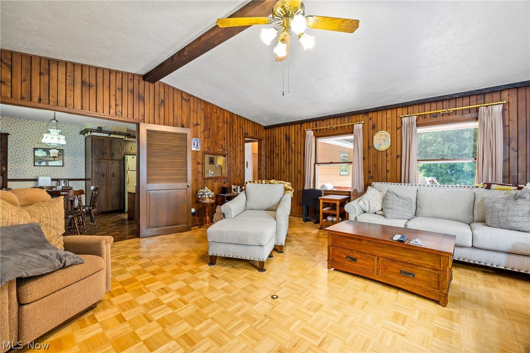 3070 Hamilton Road Medina, OH 44256 - Photo 14 of 34 Wood-paneled walls and a wood beam ceiling