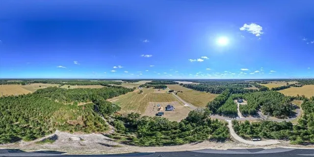 a view of a lake and a yard