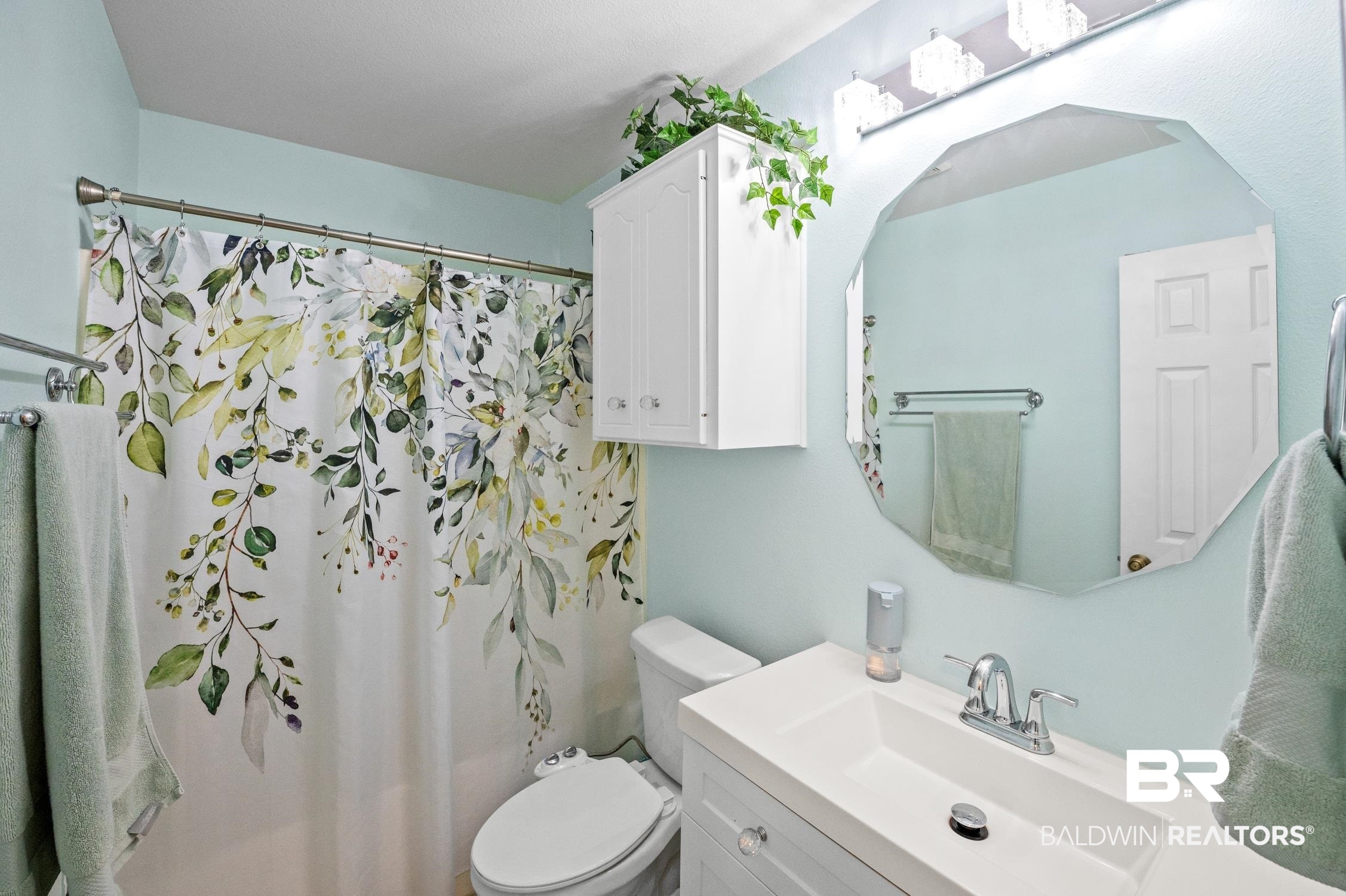 2553 Santa Rosa Drive Lillian, AL 36549 - Photo 32 of 51 Bathroom featuring a shower with shower curtain, toilet, and vanity