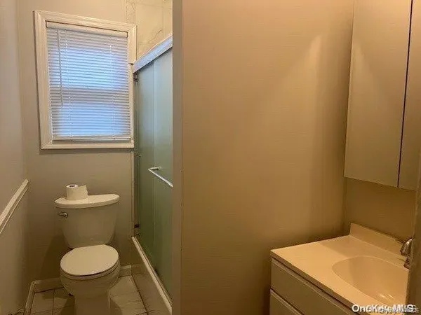 a bathroom with a sink and a toilet