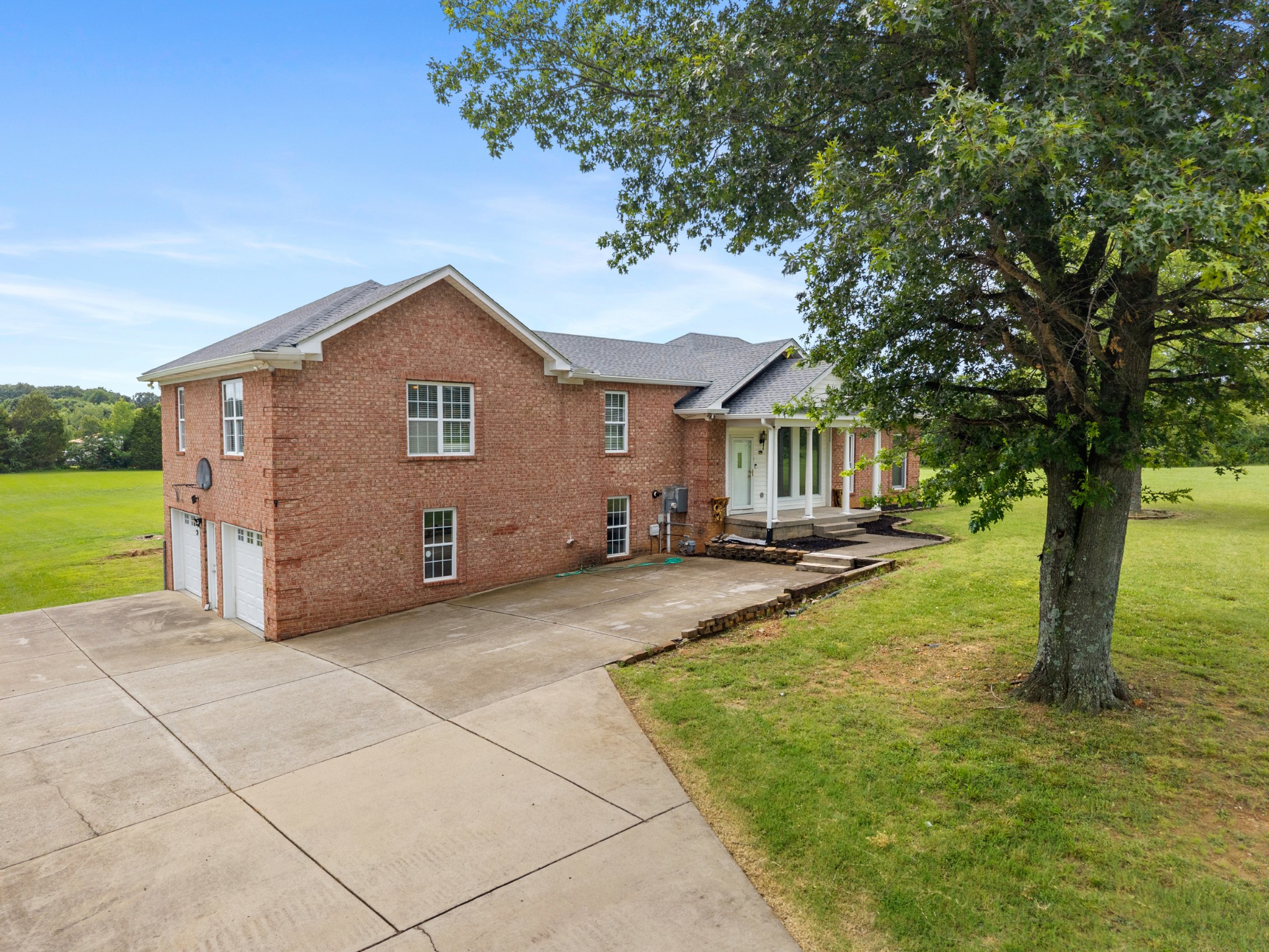 4602 Washington Road Springfield, TN 37172 - Photo 48 of 63 a view of a house with backyard and a tree