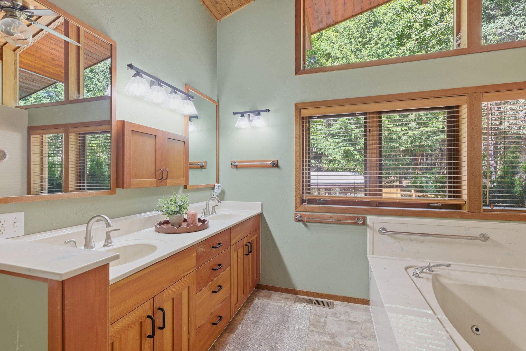 856 Greentree Loop Grants Pass, OR 97527 - Photo 26 of 62 a bathroom with a sink vanity tub and a mirror
