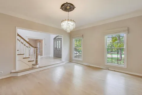 a kitchen with stainless steel appliances a stove a sink and a refrigerator