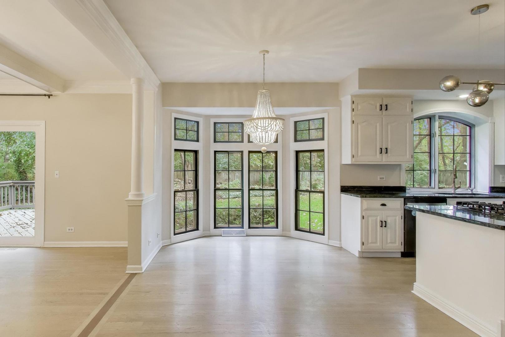 651 Nor-Oaks Court West Chicago, IL 60185 - Photo 19 of 62 a kitchen with stainless steel appliances a stove a sink and a refrigerator