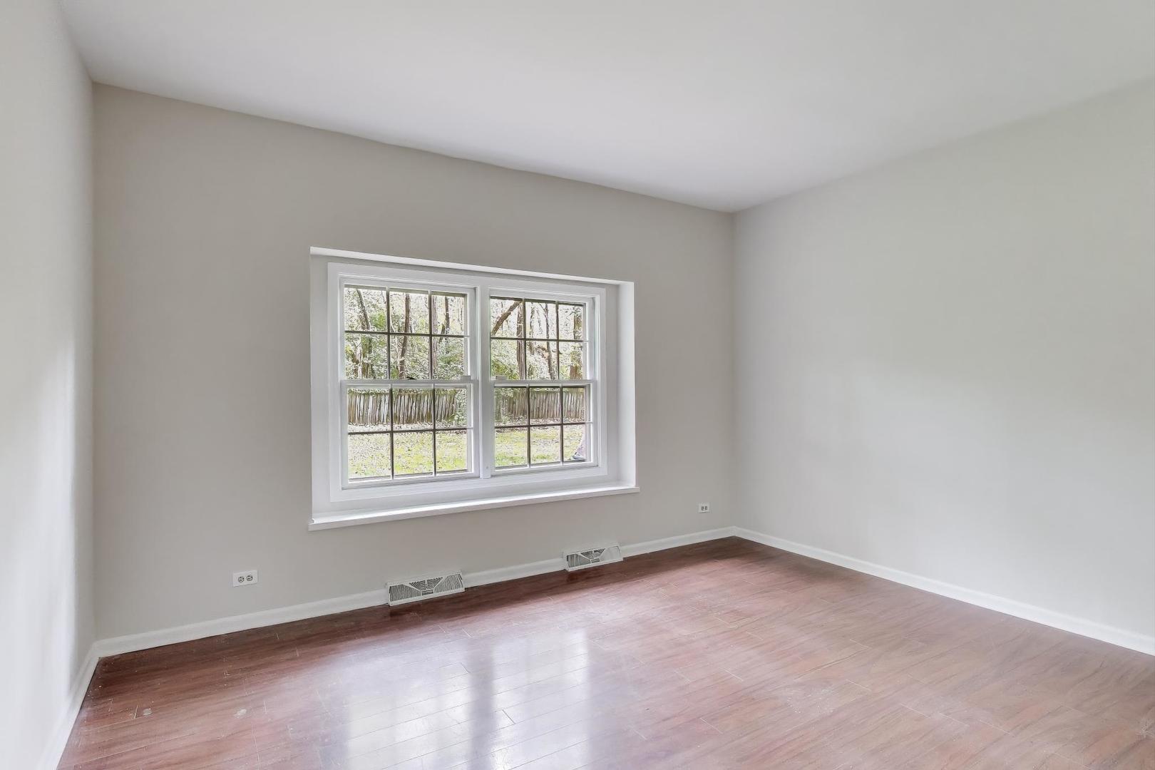 651 Nor-Oaks Court West Chicago, IL 60185 - Photo 30 of 62 an empty room with a window