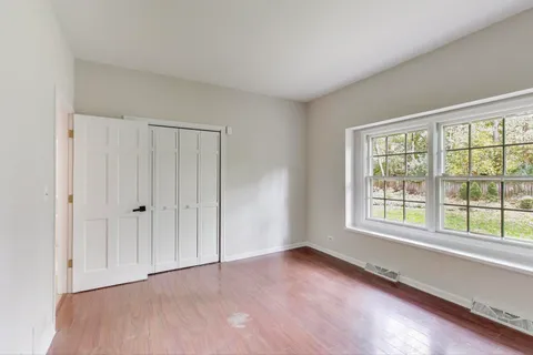 a bathroom with a toilet sink and shower