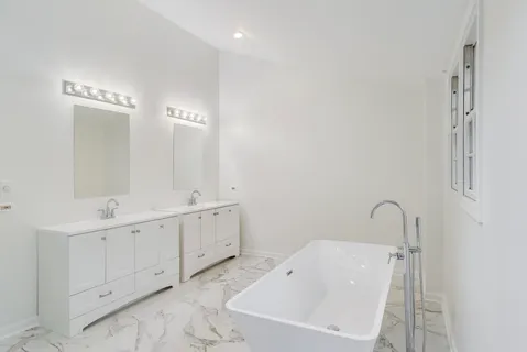 a view of a room with wooden walls