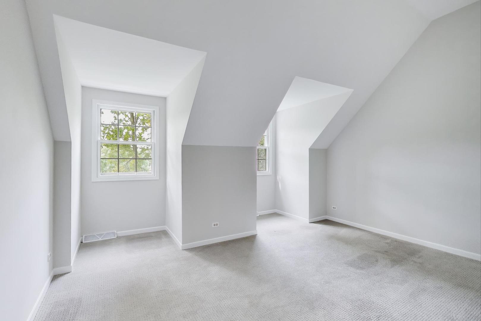 651 Nor-Oaks Court West Chicago, IL 60185 - Photo 44 of 62 an empty room with windows and closet