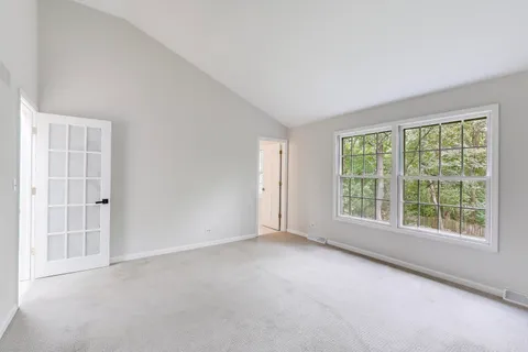 a view of backyard with green space