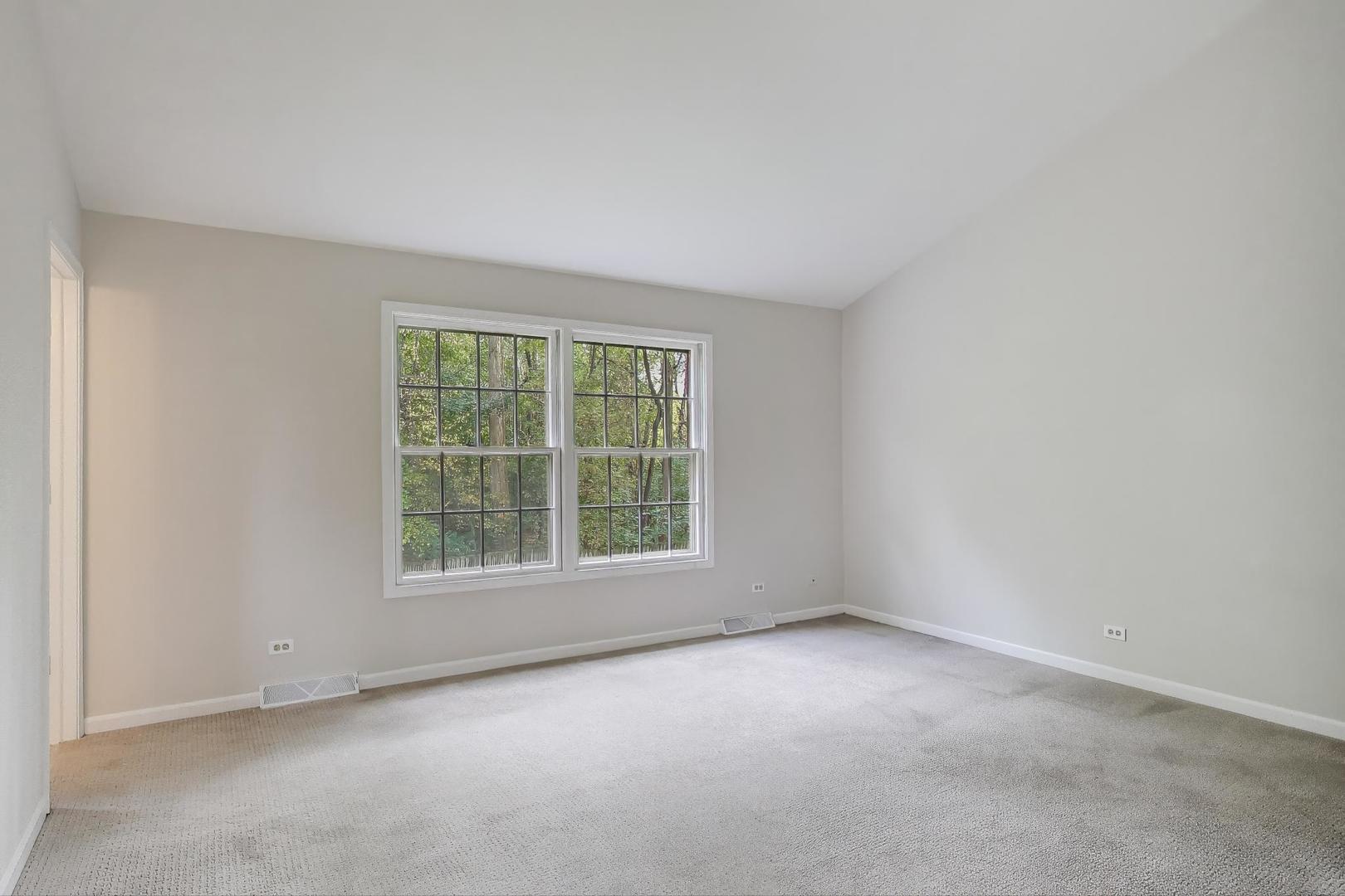 651 Nor-Oaks Court West Chicago, IL 60185 - Photo 49 of 62 an empty room with a window
