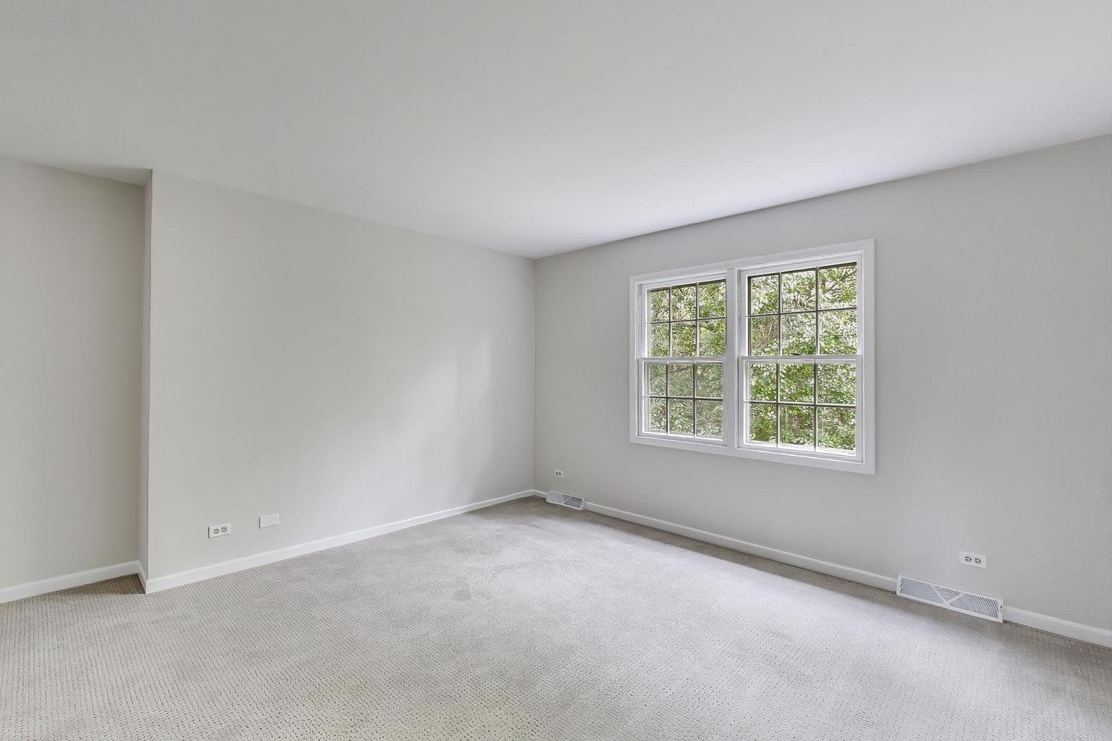 651 Nor-Oaks Court West Chicago, IL 60185 - Photo 51 of 62 an empty room with a window