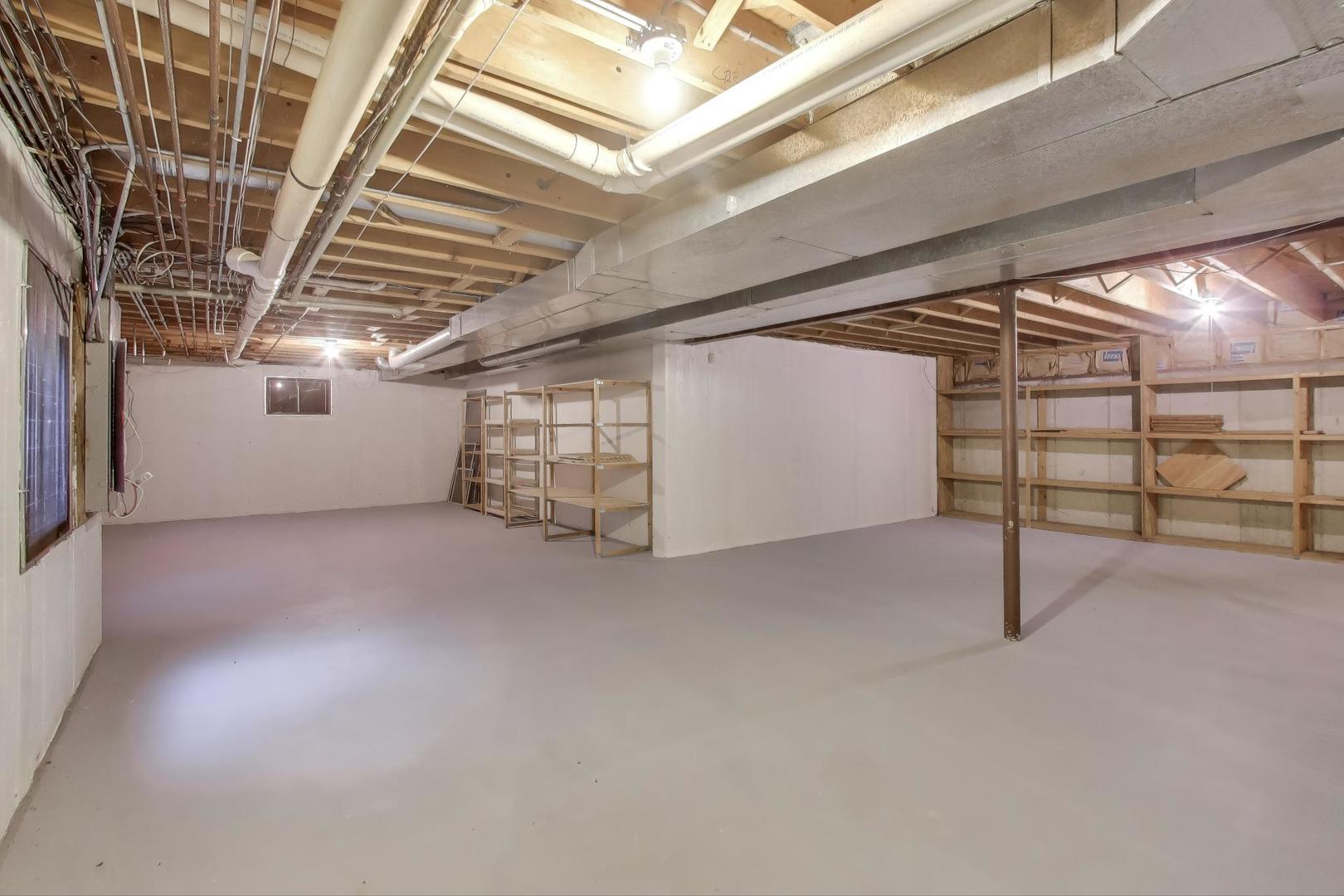 651 Nor-Oaks Court West Chicago, IL 60185 - Photo 54 of 62 a view of empty room with wooden ceiling