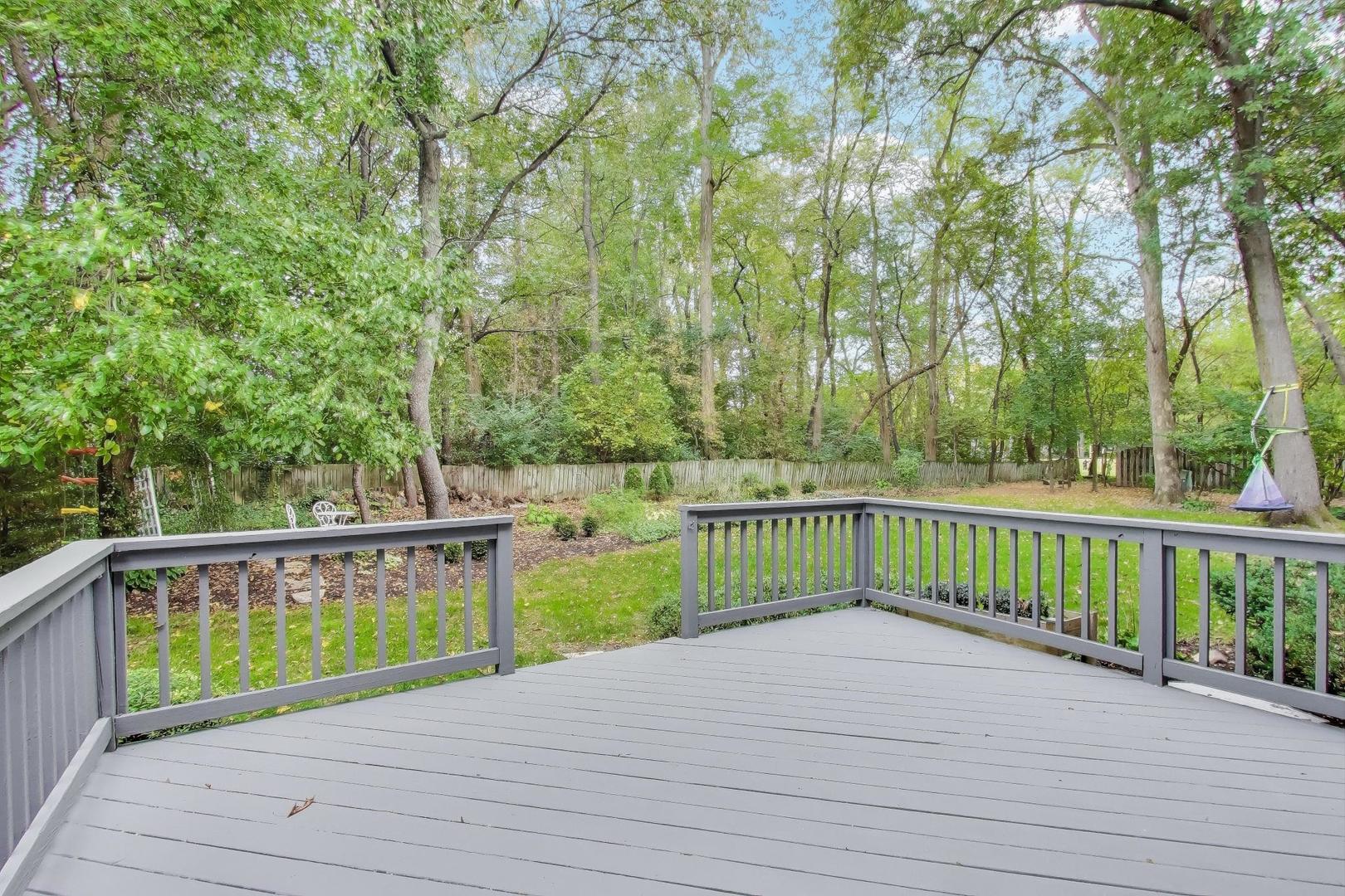 651 Nor-Oaks Court West Chicago, IL 60185 - Photo 59 of 62 a view of deck and backyard with trees
