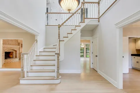 a view of front door with stairs