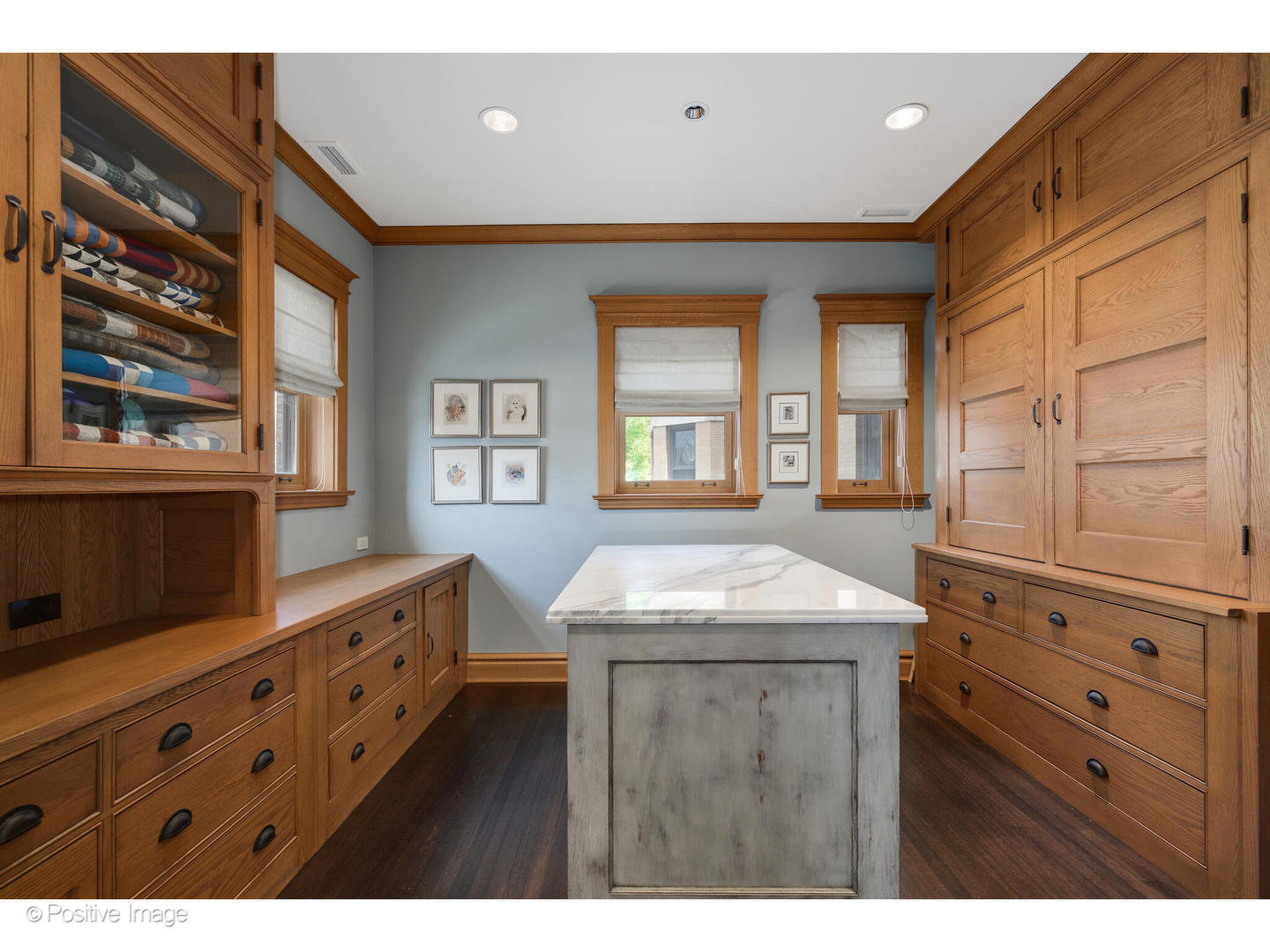 536 West Barry Avenue Chicago, IL 60657 - Photo 29 of 55 a kitchen that has a lot of cabinets in it with granite countertop a sink
