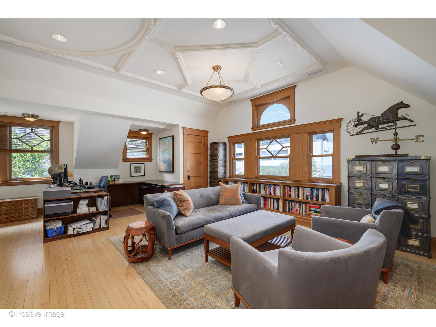 536 West Barry Avenue Chicago, IL 60657 - Photo 10 of 55 a living room with furniture a chandelier and a window
