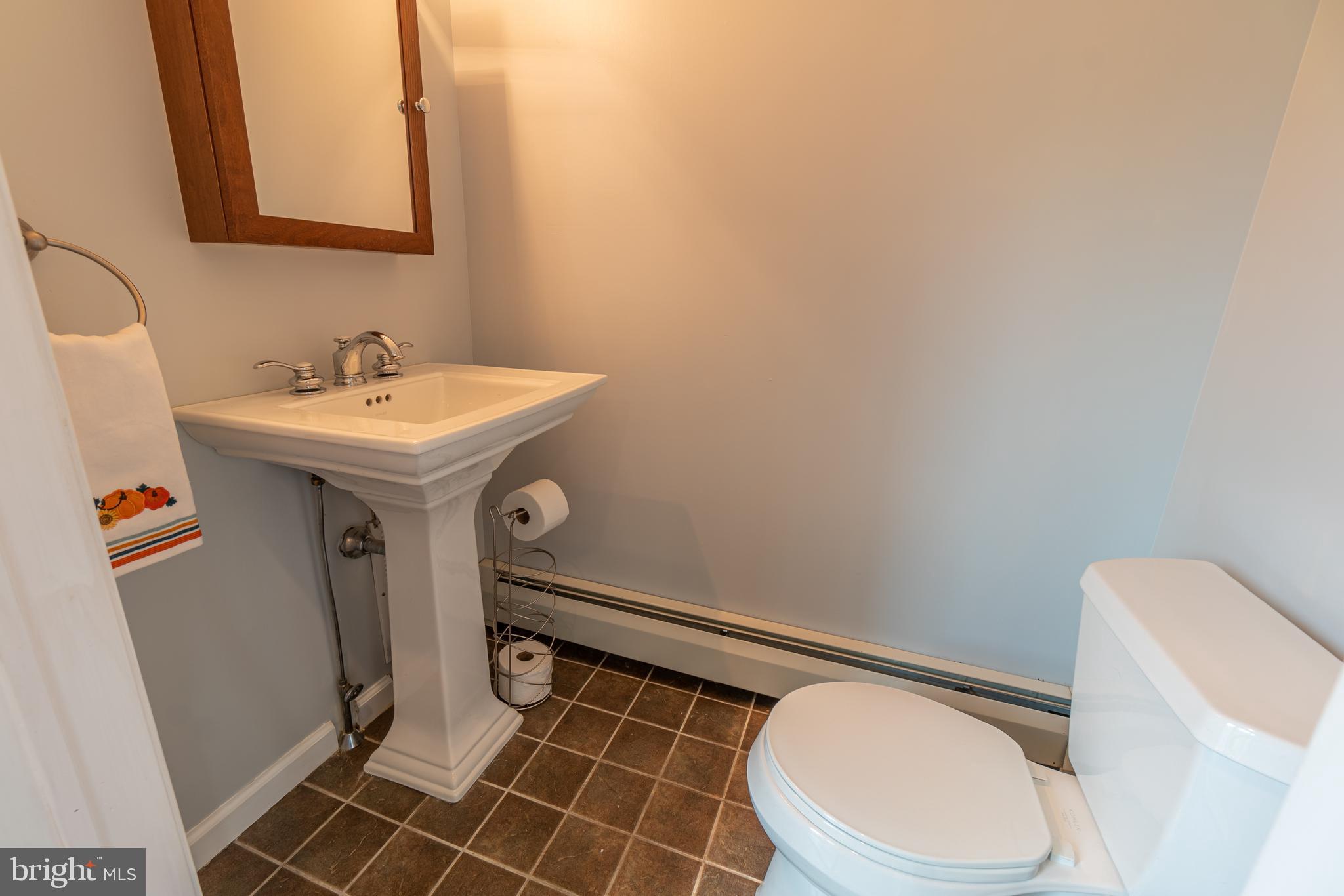54 Ridge Lane Levittown, PA 19055 - Photo 37 of 43 First floor 1/2 bath