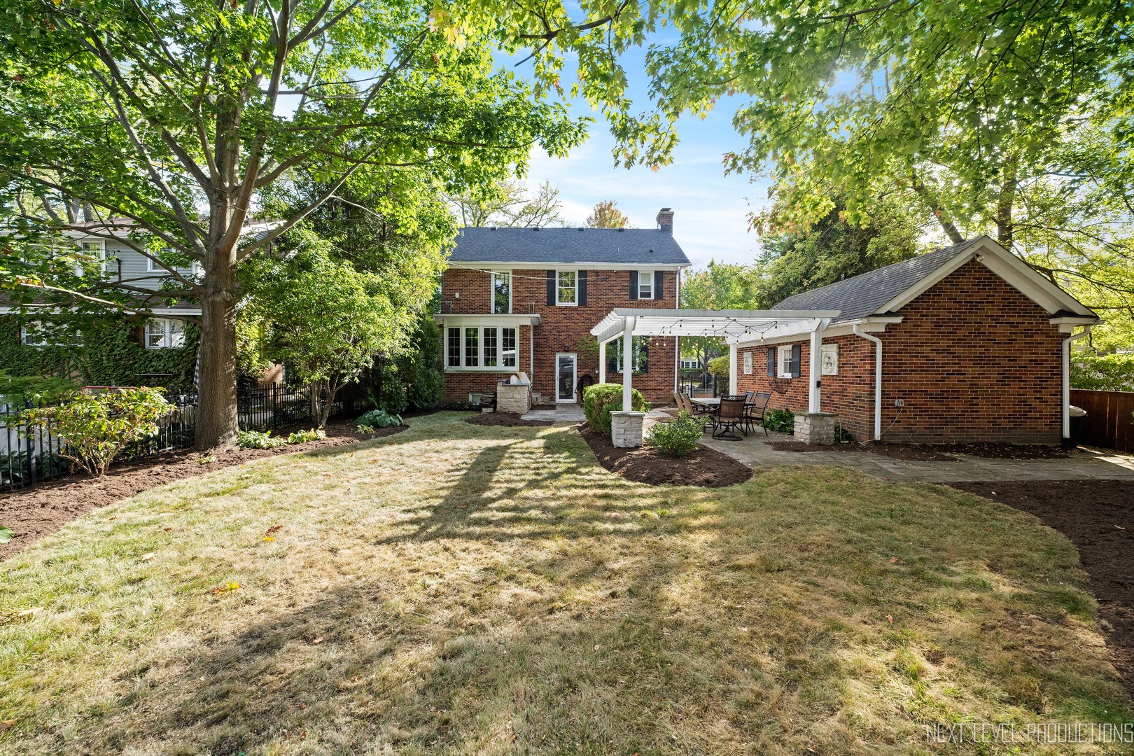 1205 South 4th Street St. Charles, IL 60174 - Photo 25 of 28 a front view of a house with a yard