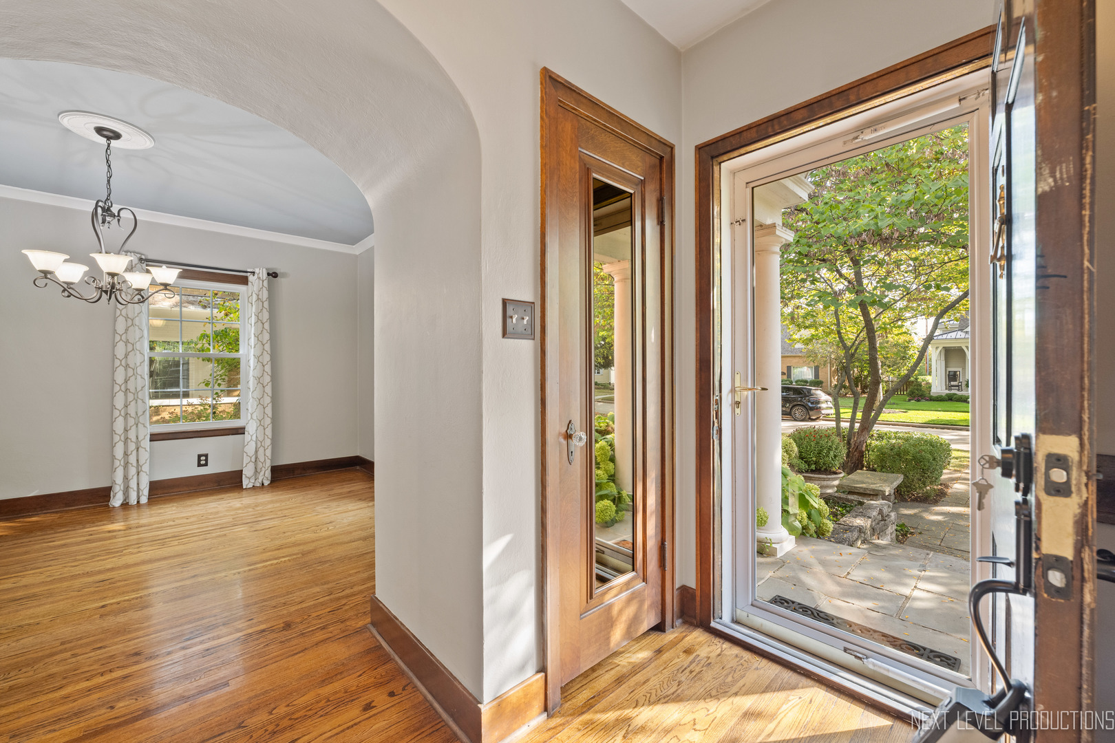 1205 South 4th Street St. Charles, IL 60174 - Photo 3 of 28 a view of livingroom with furniture window and wooden floor