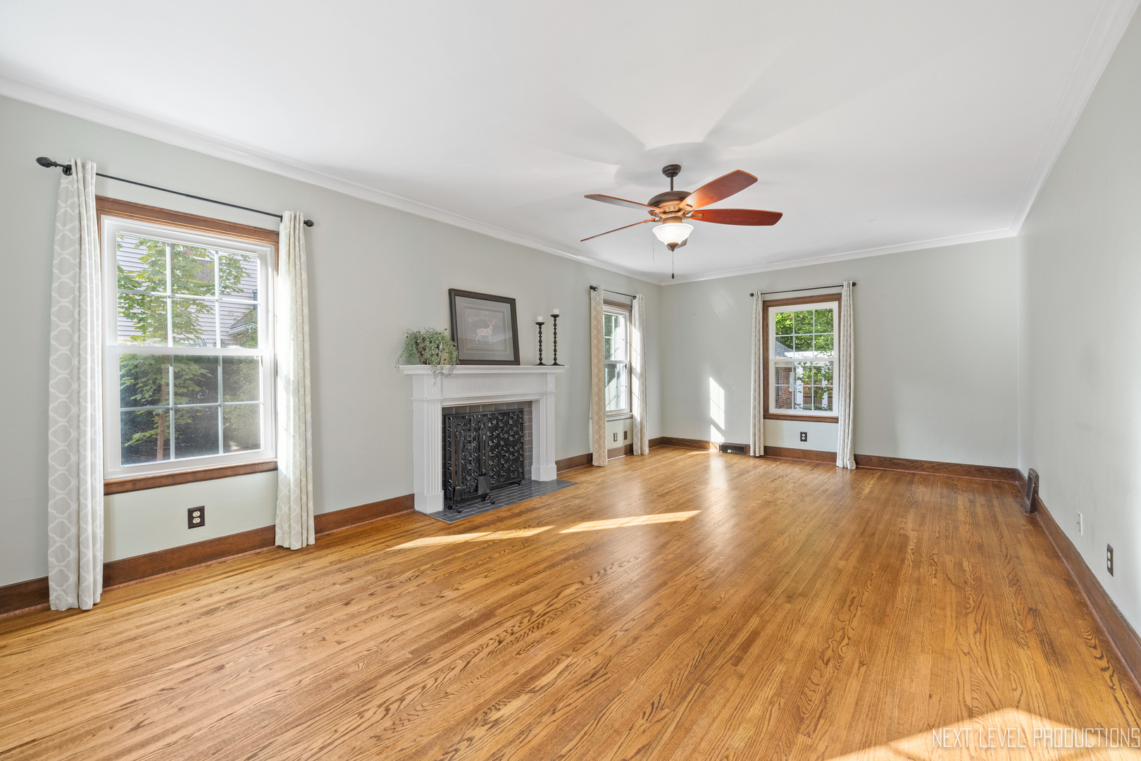 1205 South 4th Street St. Charles, IL 60174 - Photo 4 of 28 a view of an empty room with window and wooden floor