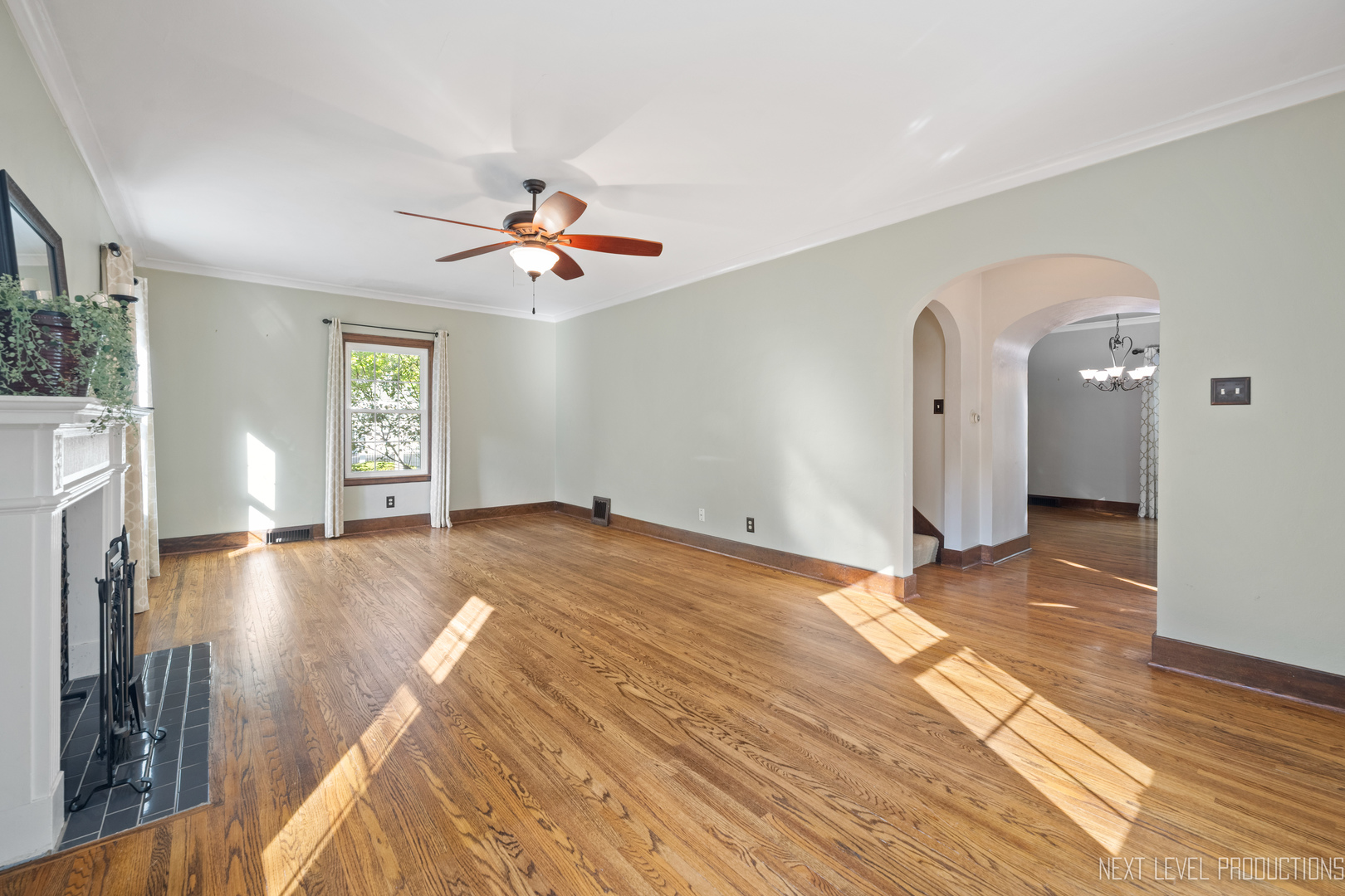 1205 South 4th Street St. Charles, IL 60174 - Photo 5 of 28 a view of empty room with window and wooden floor