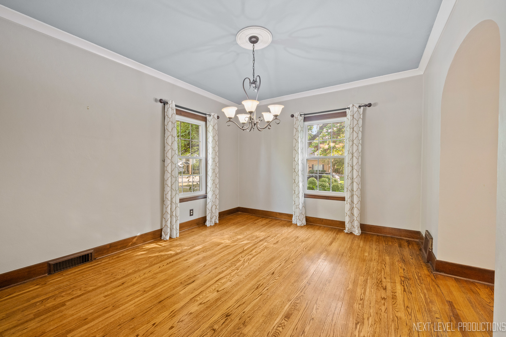 1205 South 4th Street St. Charles, IL 60174 - Photo 6 of 28 a view of livingroom with window and hardwood floor