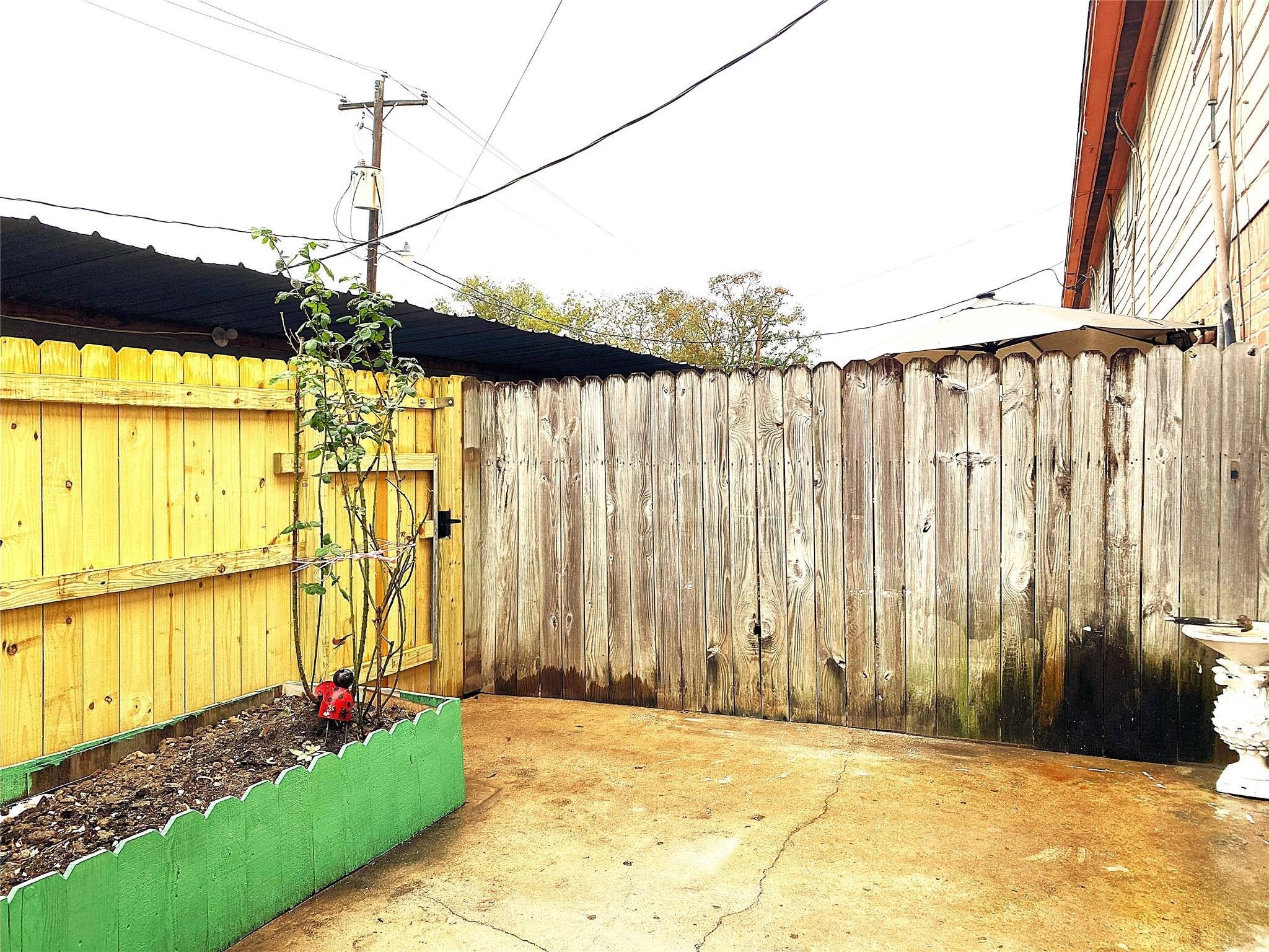 7831 Fuqua Street, Unit 7831 Houston, TX 77075 - Photo 11 of 15 a view of a back yard of the house