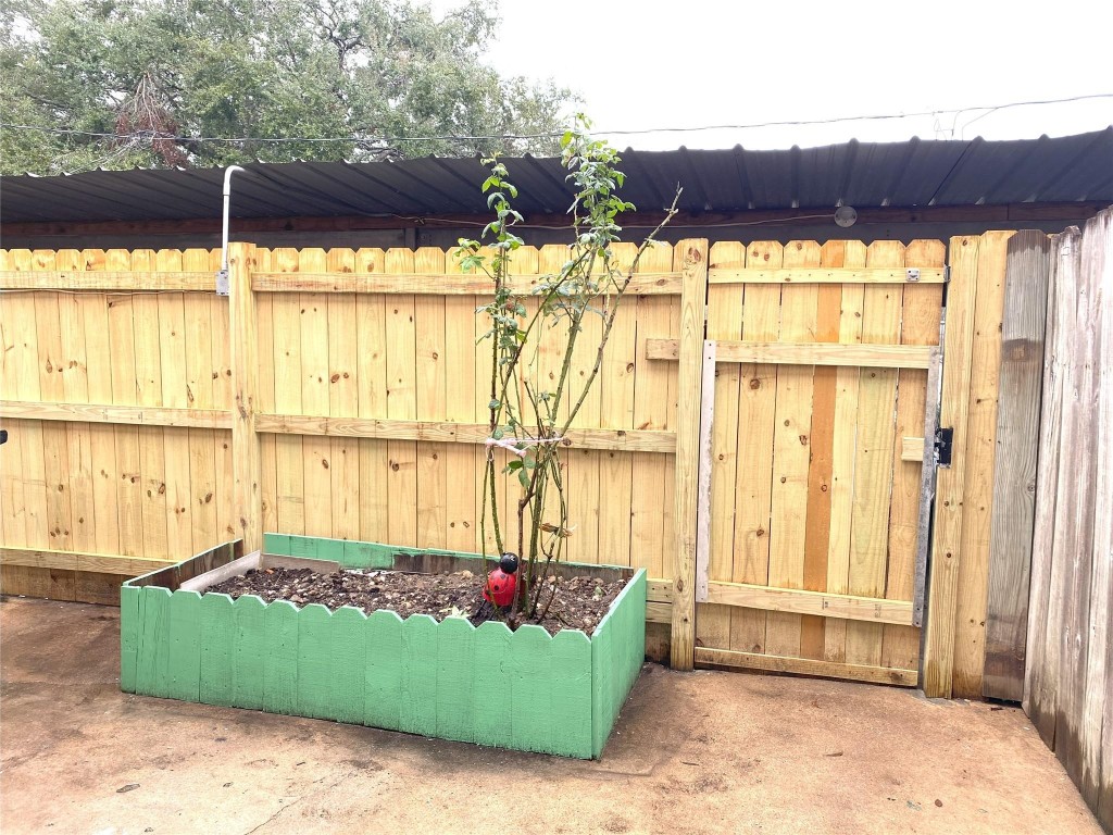 7831 Fuqua Street, Unit 7831 Houston, TX 77075 - Photo 12 of 15 a front view of a house with a yard