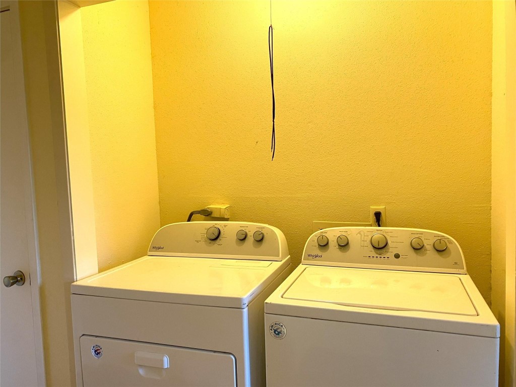 7831 Fuqua Street, Unit 7831 Houston, TX 77075 - Photo 7 of 15 a utility room with dryer and washer