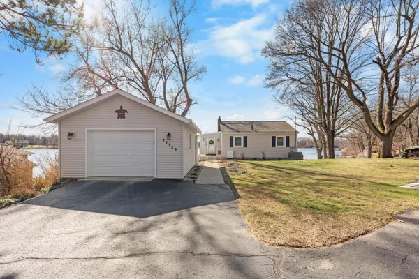 $439,900 | 11159 West Perch Lake Drive, Cement City, MI 49233