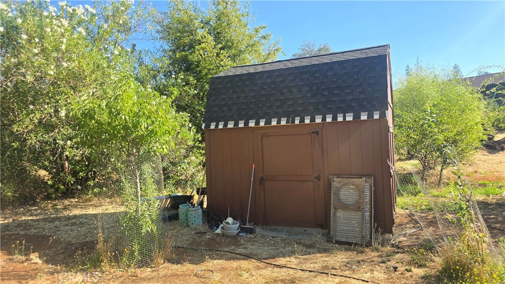 1833 Stark Lane Paradise, CA 95969 - Photo 16 of 28 a building with trees in the background