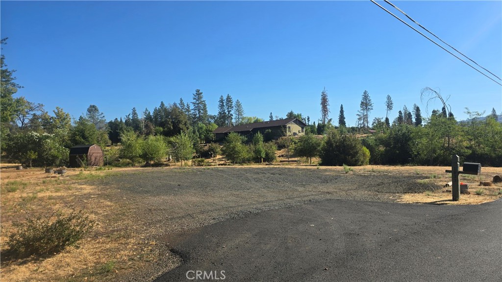 1833 Stark Lane Paradise, CA 95969 - Photo 27 of 28 a view of a road with a yard
