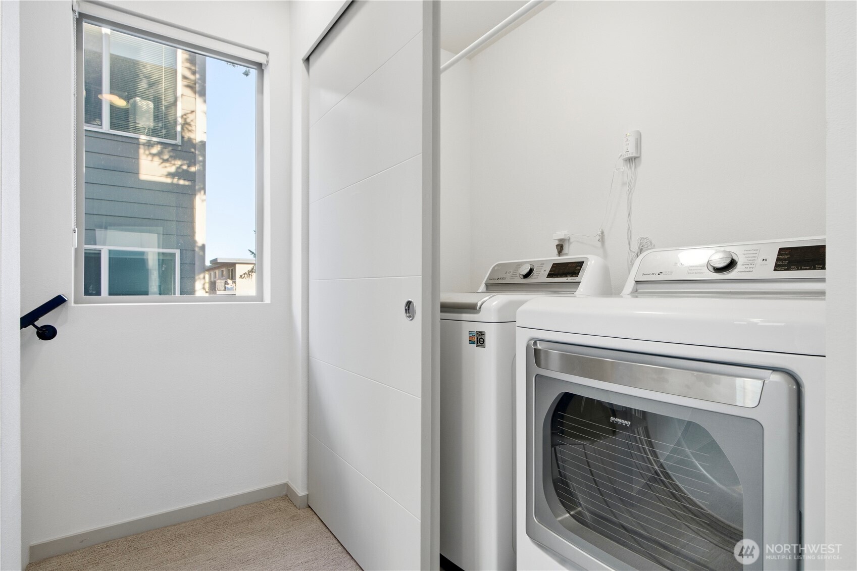 4416 Francis Avenue North, Unit B Seattle, WA 98103 - Photo 15 of 26 a utility room with dryer and washer