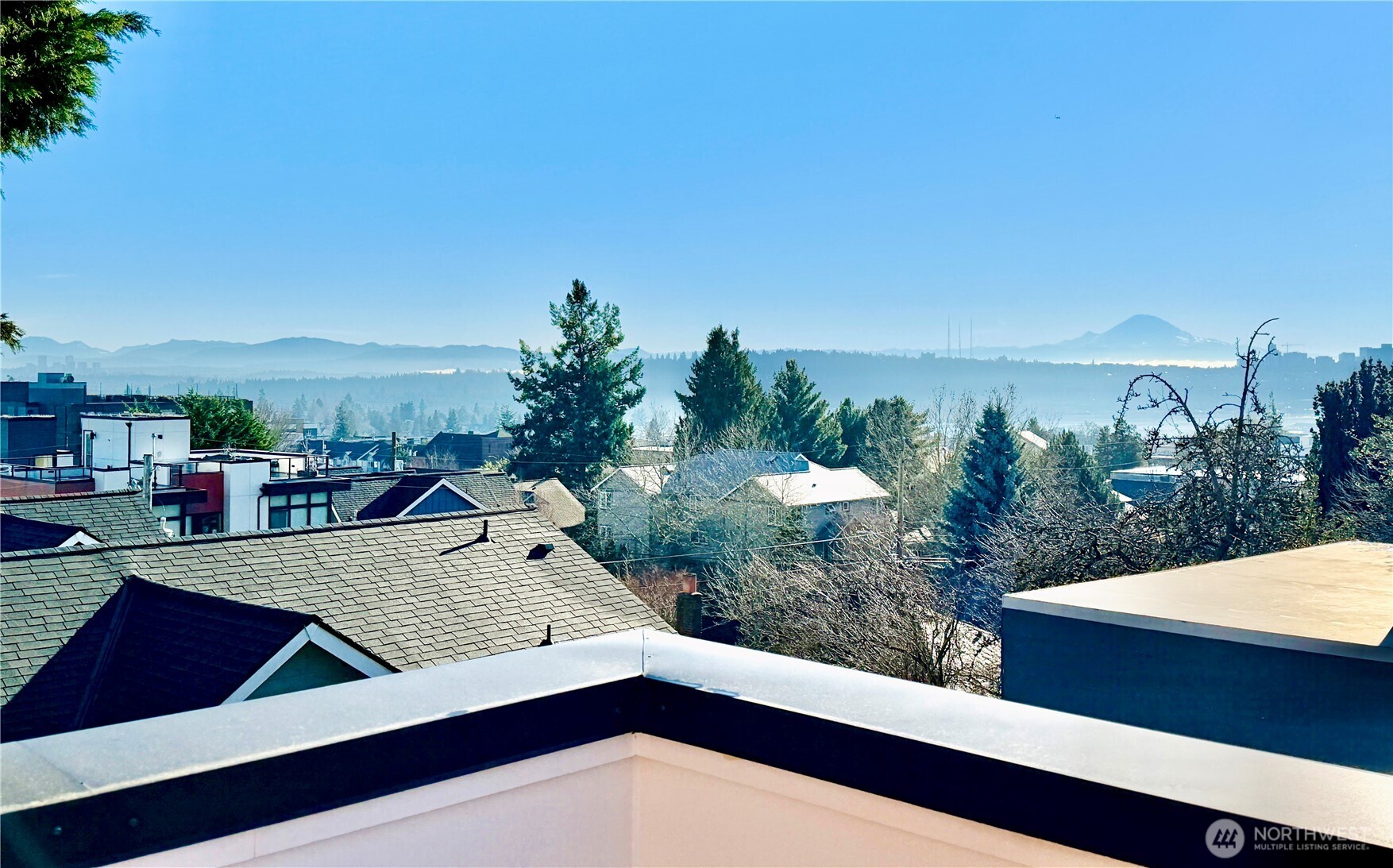 4416 Francis Avenue North, Unit B Seattle, WA 98103 - Photo 24 of 26 a view of a city from a terrace
