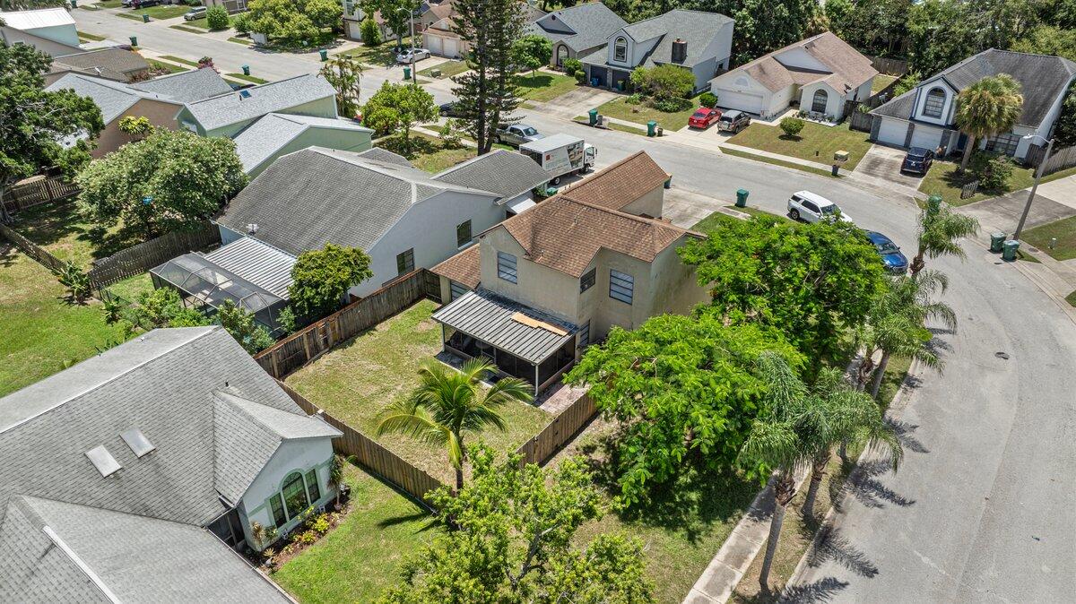 1645 Clover Circle Melbourne, FL 32935 - Photo 39 of 43 an aerial view of residential house with outdoor space