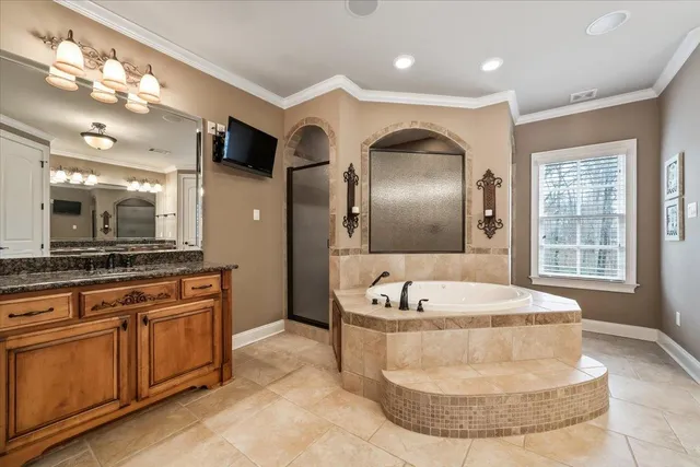 a bathroom with a toilet a sink and a mirror