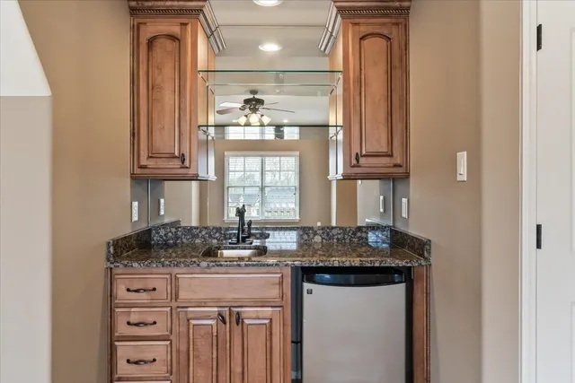 a view of walk in closet with window