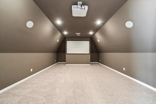 a view of a house with backyard porch and sitting area