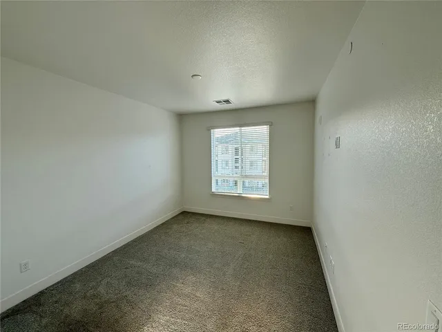 a view of staircase with wooden floor