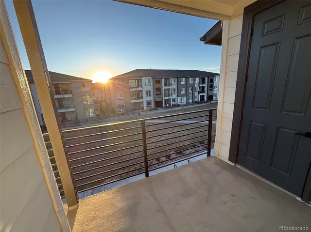 a front view of a building with a street