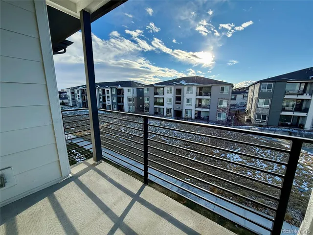 a view of a building from a balcony