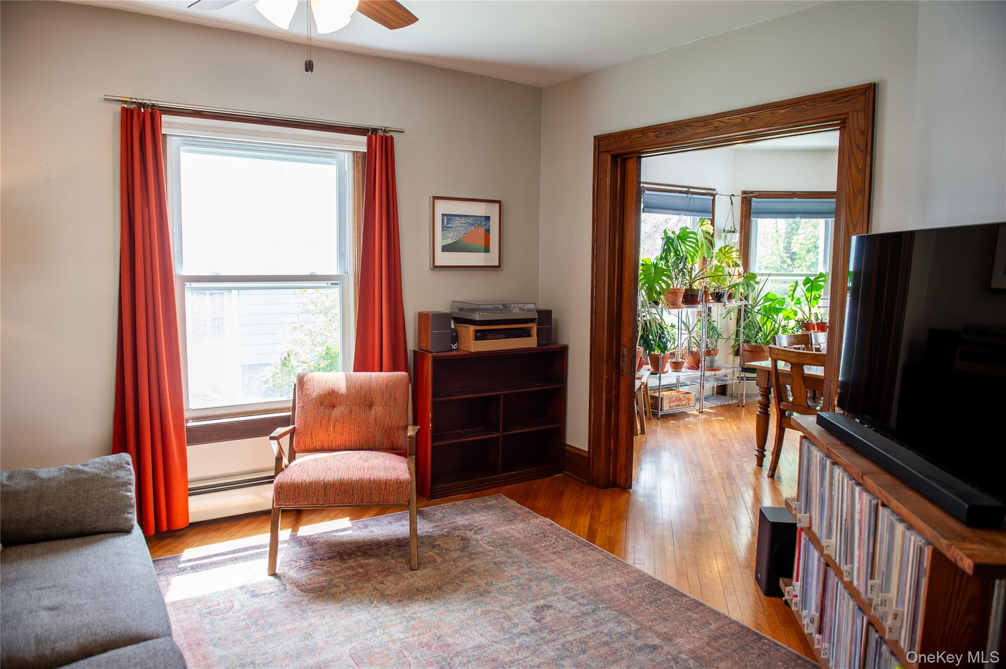 350 Smith Street Peekskill, NY 10566 - Photo 8 of 32 a living room with furniture and a flat screen tv
