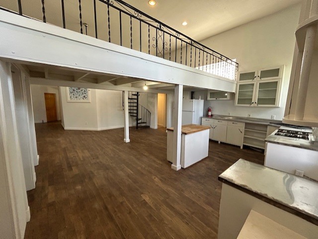 109 North Main Street, Unit A Taylor, TX 76574 - Photo 2 of 17 a living room with stainless steel appliances kitchen island granite countertop a stove and a sink