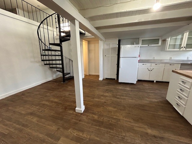 109 North Main Street, Unit A Taylor, TX 76574 - Photo 4 of 17 a view of entryway with wooden floor and stairs