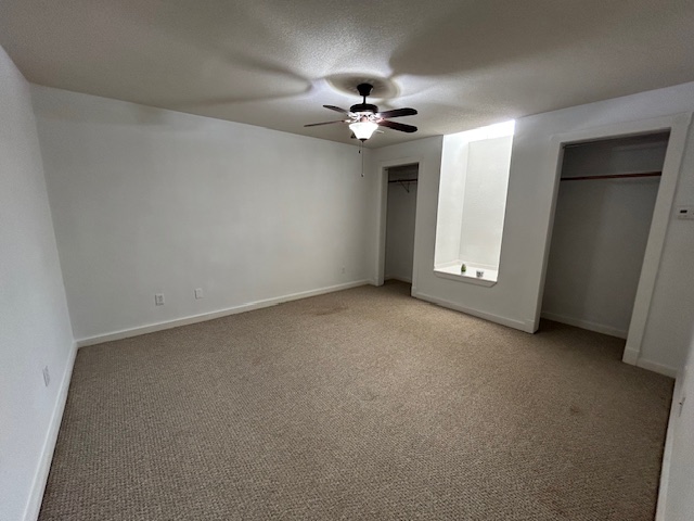 109 North Main Street, Unit A Taylor, TX 76574 - Photo 9 of 17 a view of an empty room with a ceiling fan