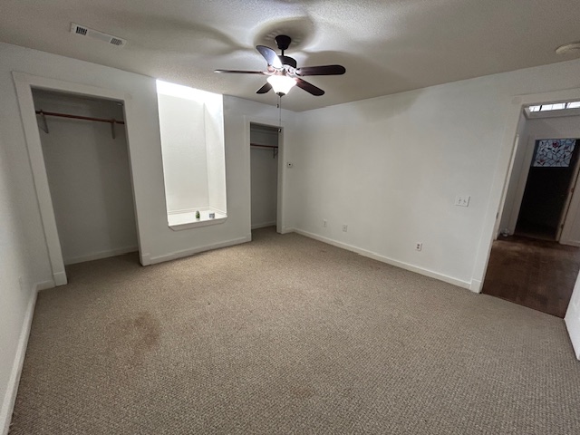 109 North Main Street, Unit A Taylor, TX 76574 - Photo 10 of 17 an empty room with ceiling fan and window