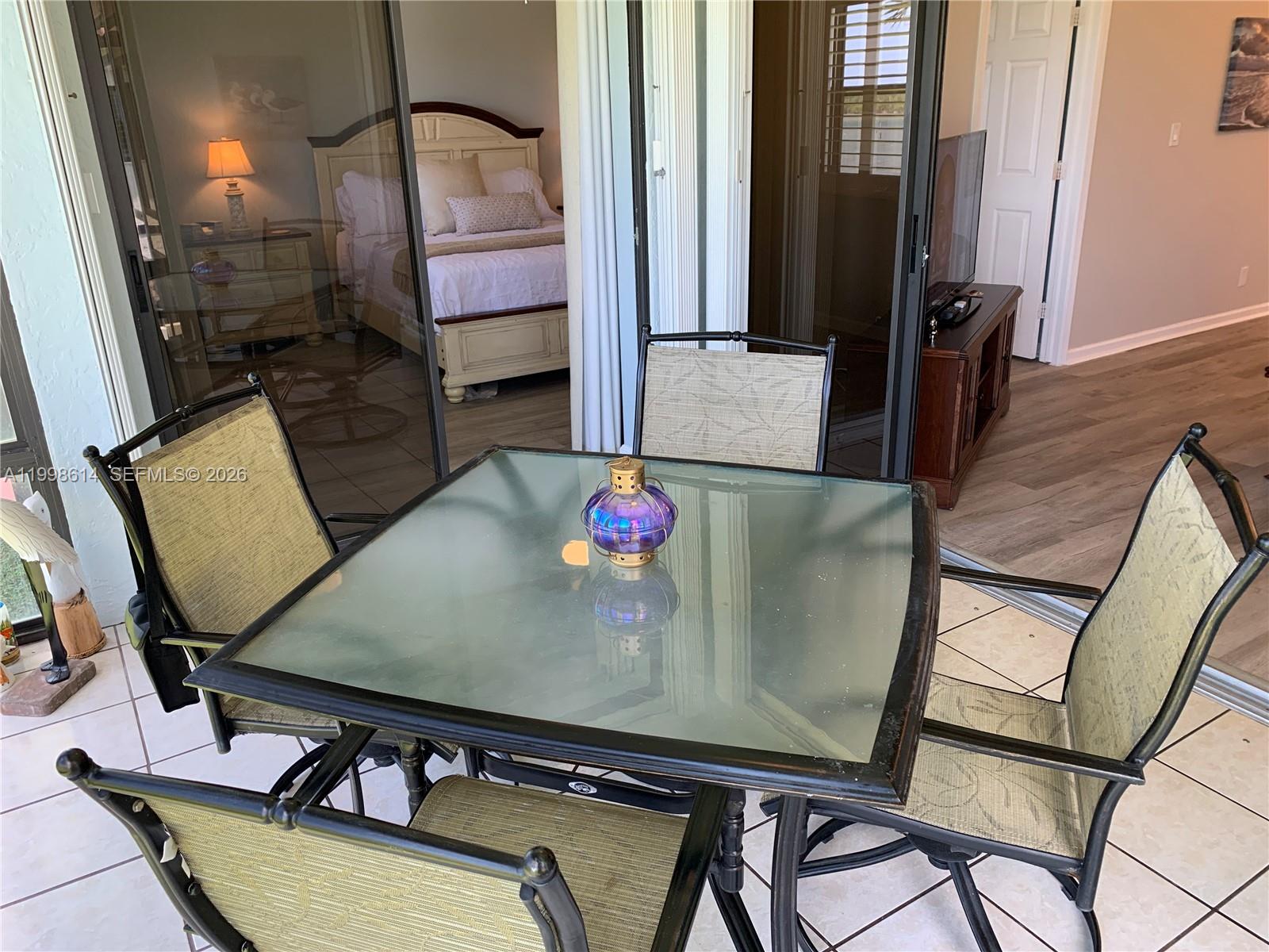 6082 Southeast Landing Way, Unit 10 Stuart, FL 34997 - Photo 21 of 35 a view of a living room with furniture