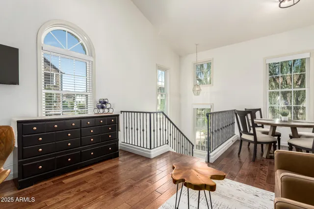 a kitchen with granite countertop a refrigerator stove and sink