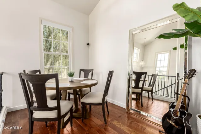 a kitchen with a sink stainless steel appliances and cabinets