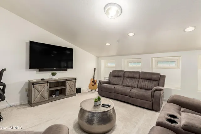 a living room with furniture and a couch